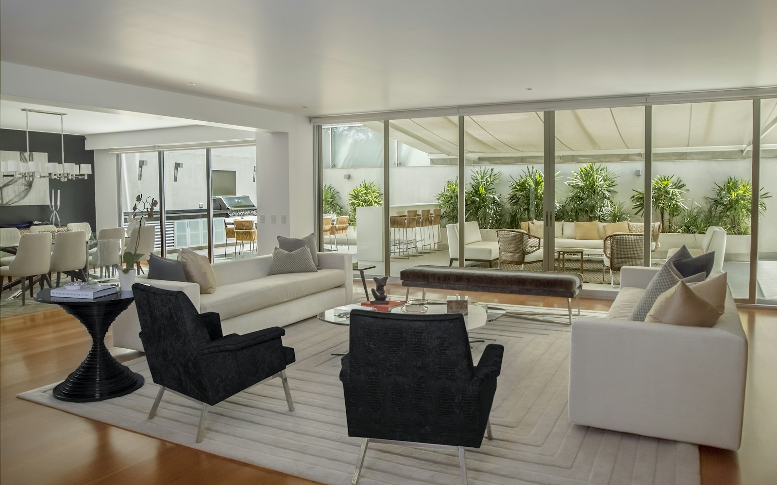 The Copenhagen lounge, with pale armchairs and glazed partitions